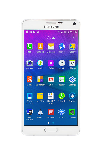 Varna, Bulgaria - February 27, 2015: Varna, Bulgaria - February 27, 2015: Studio shot of a white Samsung Galaxy Note 4 smartphone, with 16 mP Camera, quad-core 2,7 GHz and 5.7 inch display, 1440x 2560 pixels resolution.
