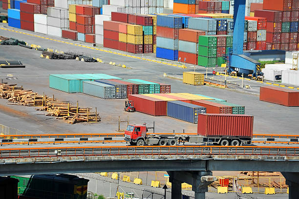 istock Cargo container in port and truck 465839151