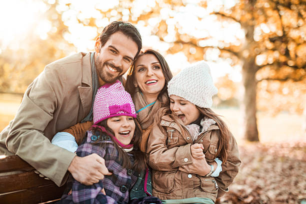 istock Happy family enjoying in autumn. 465843574