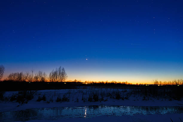 istock The first stars in the background of a bright sunset. 465846236