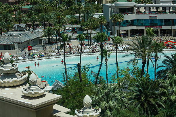 Las Vegas, NV, USA - June 11, 2013:  People at artificial beach in Mandalay Bay hotel in Las Vegas on June 11, 2013. This wave pool features two to four foot waves in regular intervals.