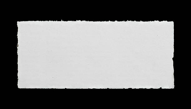 A rectangle of paper with ripped edges stock photo