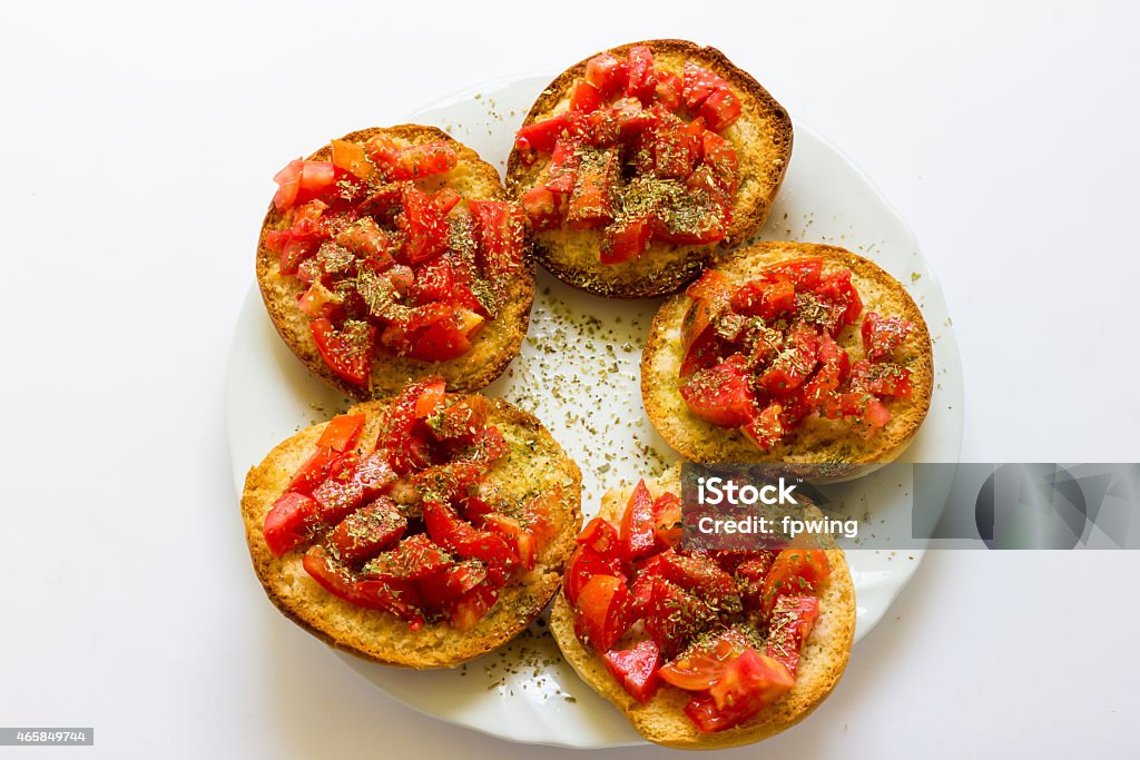 Italian bruschetta with tomato and italian bread frise 2015 Stock Photo