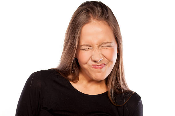 istock Young woman with sour gesture 465852464