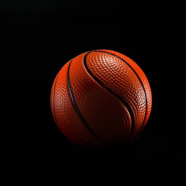 istock basketball ball isolated on black 465852882