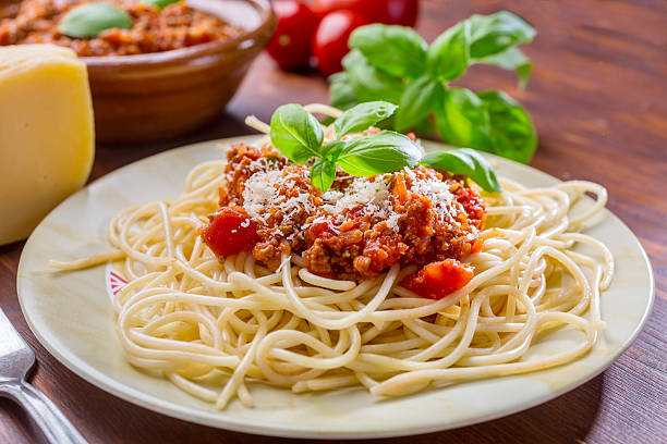 istock Spaghetti Bolognese with cheese and basil 465854587