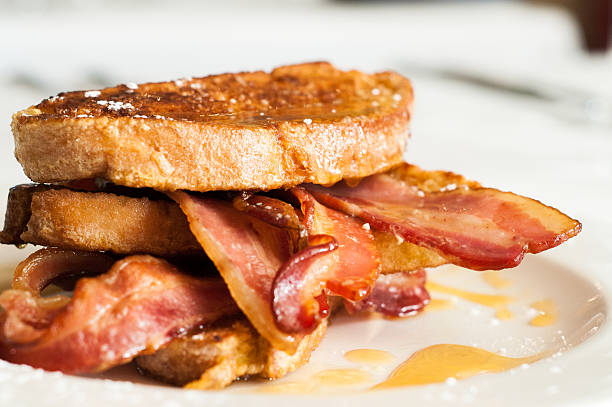 Bacon is best A Delicious meal in a restaurant setting french toast stock pictures, royalty-free photos & images