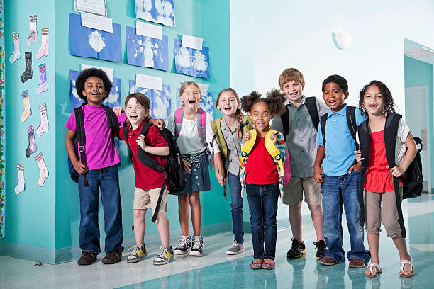 istock Children in school hallway 465854719