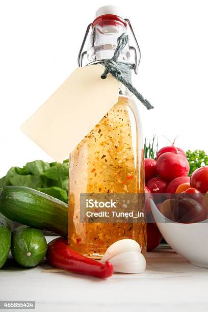 Homemade Herb Dressing In Bottle And Salad Ingredients Stock Photo - Download Image Now