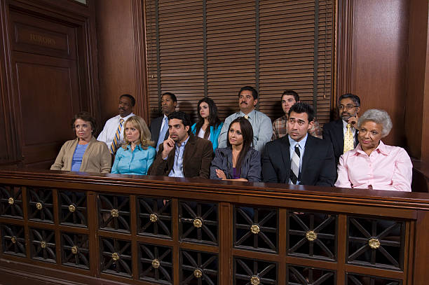 Court room jury box filled with jurors stock photo