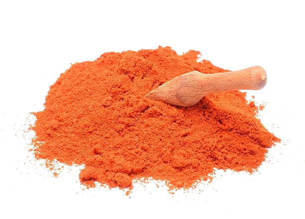 istock paprika powder on white background 465873398