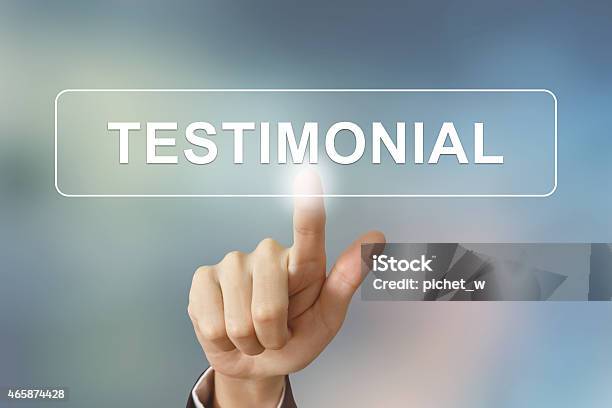 Business Hand Clicking Testimonial Button On Blurred Background Stock Photo - Download Image Now