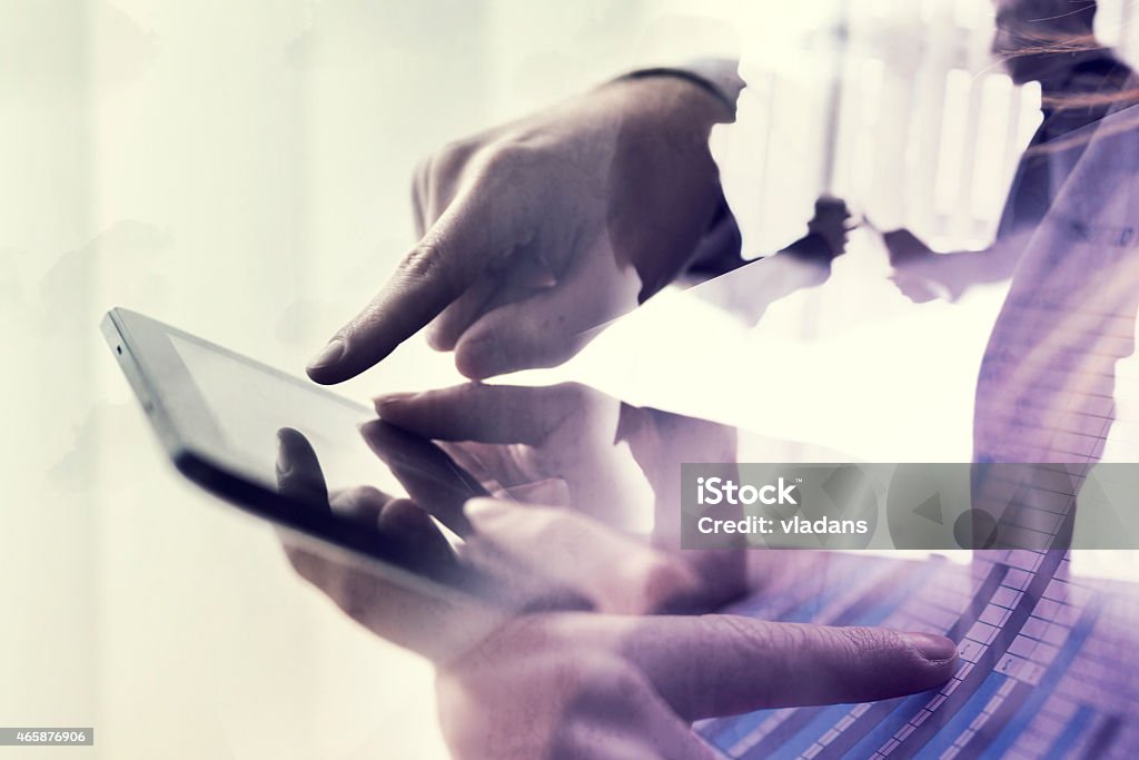 Modern business Double exposure business people in working environment Multiple Exposure Stock Photo