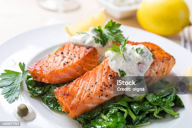 Salmon Steak With Cream Sauce Stock Photo - Download Image Now - Salmon - Seafood, Plate, Spinach