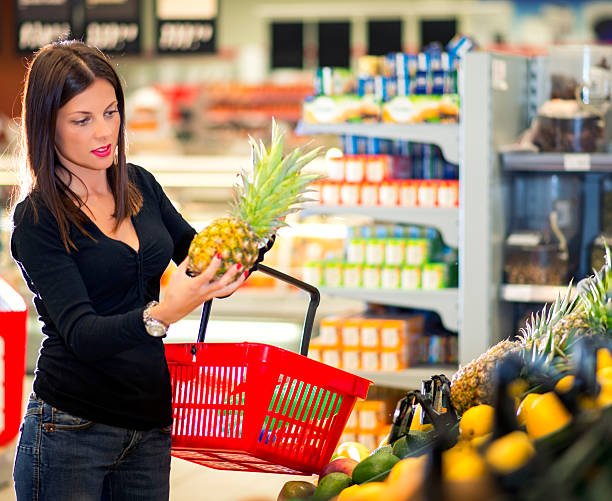 istock Woman Shopper pineapple 465877421
