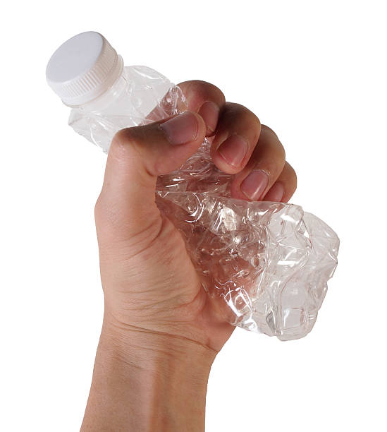 istock Hand grab used plastic bottle, isolated on white 465877870