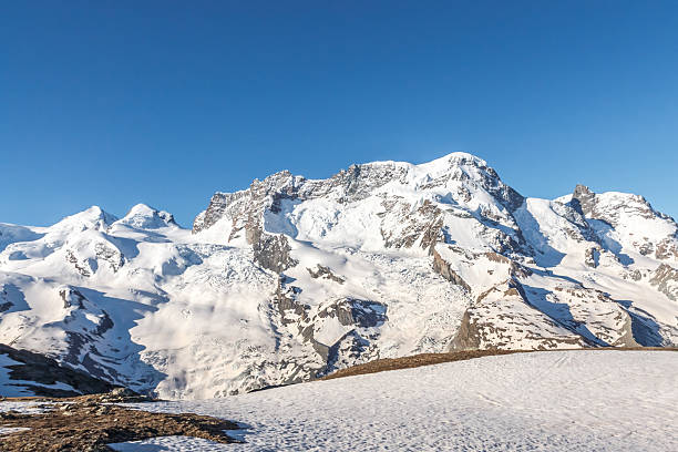 istock mountain with blue sky, Alps, Zermatt, Switzerland 465877906