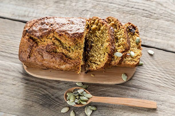 istock Pumpkin bread on the wooden board 465880736