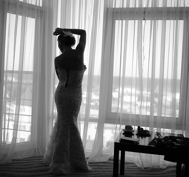 istock silhouette of bride 465881890