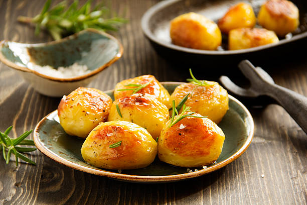 Baked potatoes with rosemary.