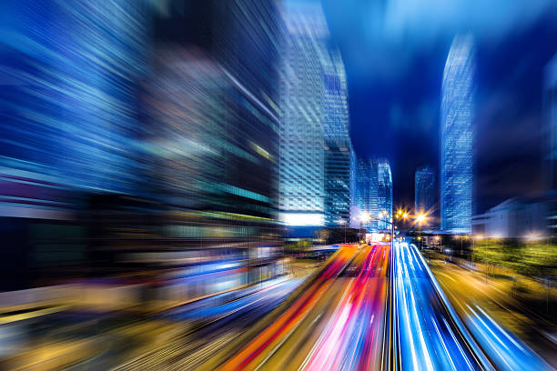 istock Motion blurred city background in hong Kong central district 465884154