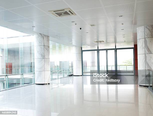 Long White Empty Corridor With Large Glass Panels Stock Photo - Download Image Now - Office, Lobby, Hospital