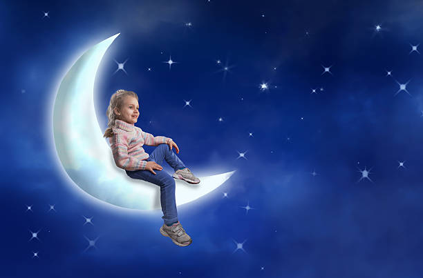 istock Little girl sits on the moon 465885284