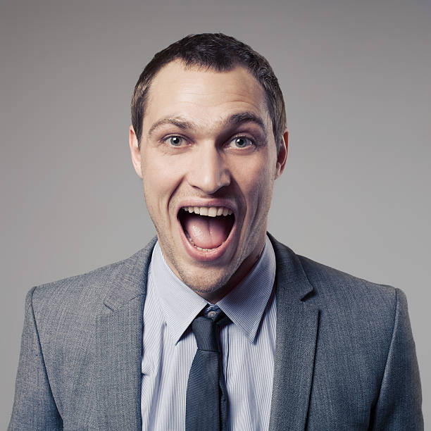 istock Happy Businessman Screaming 465885477