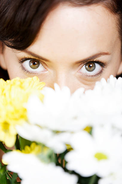 istock Woman holding flowers 465886923
