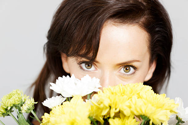 istock Woman holding flowers 465887039