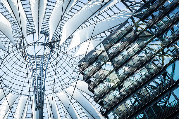 istock Low angle view to the top of modern architecture structure 465887116