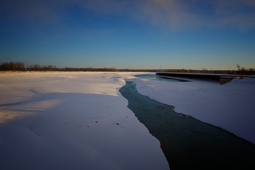 A sunset scene of the Welland Canal, near St. Catharines, Ontario, drained for the winter
