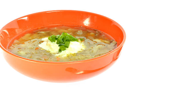 istock Orange bowl of soup with cabbage 465887558