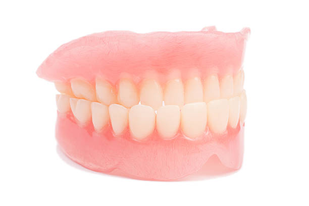 Denture isolated on white stock photo
