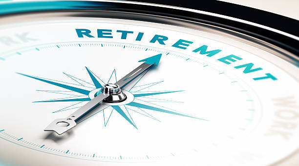 Retirement Compass with needle pointing the word retirement, concept image to illustrate retirement planning guidance photos stock pictures, royalty-free photos & images