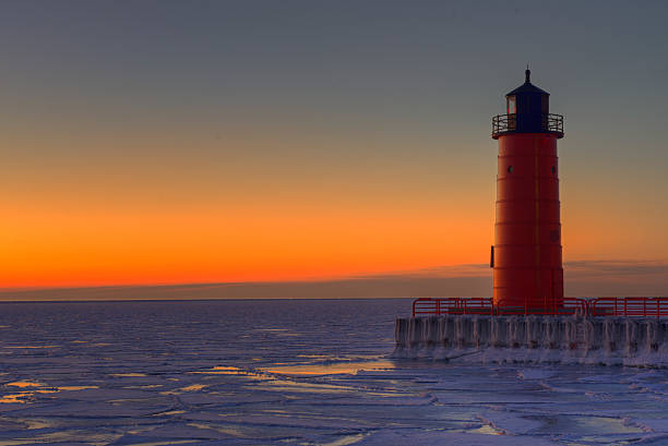istock Red lighthouse in winter at sunrise - HDR 465890170