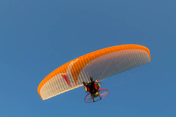 paragliding into the sunset summer paragliding-Hungaryparagliding into the sunset-Hungary para ascending stock pictures, royalty-free photos & images