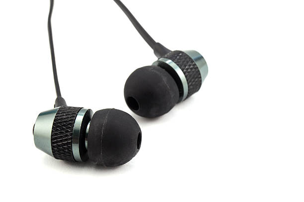 istock earphones on white background 465894116