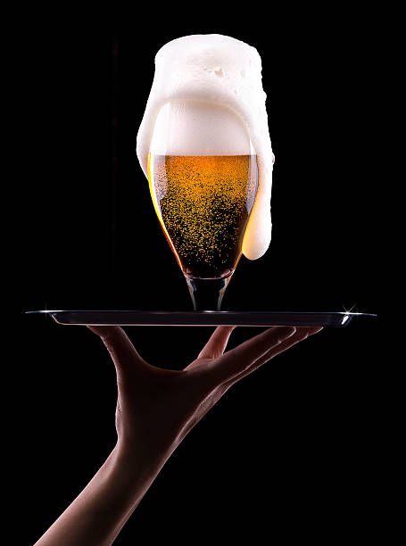 istock Beer into glass on a black 465894787