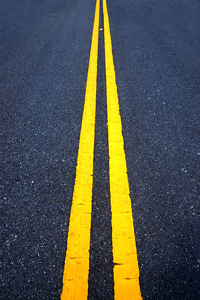 istock Empty road and the traffic lines. 465896569