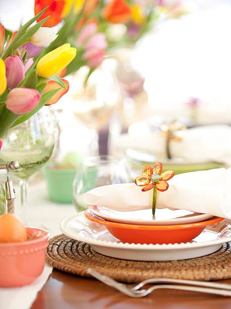 istock Easter dining table, bouquet of tulips and lovely place setting 465897226