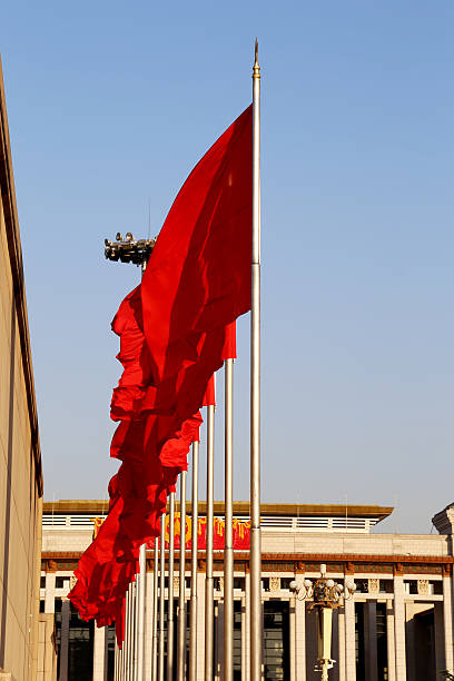 istock Red flags on the Tiananmen Square, Beijing, China 465899827