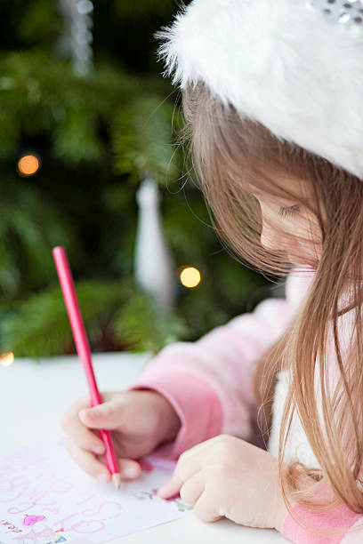 istock Little Girl Writing a Letter. 465900431