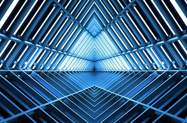 Photo of metal structure similar to spaceship interior in blue light