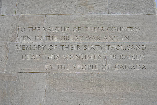 Inscription, Canadian War Memorial, Vimy Ridge The inscription in memory of those Canadian soldiers who gave their lives for their country during the First World War vimy memorial stock pictures, royalty-free photos & images