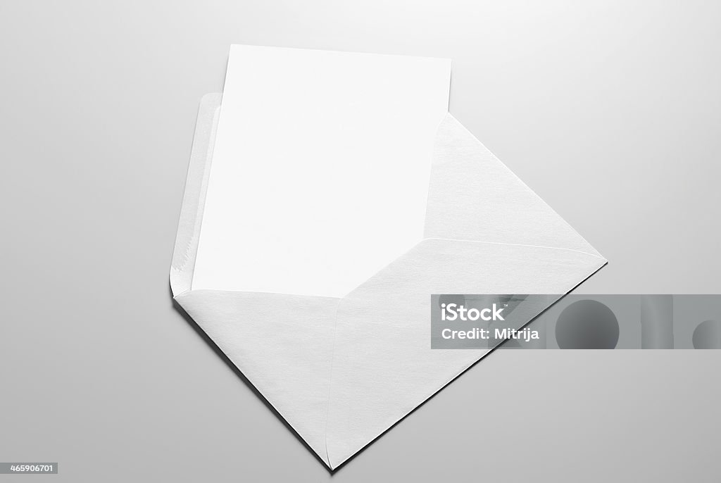 Blank card and envelope Blank card and envelope over grey background Invitation Stock Photo