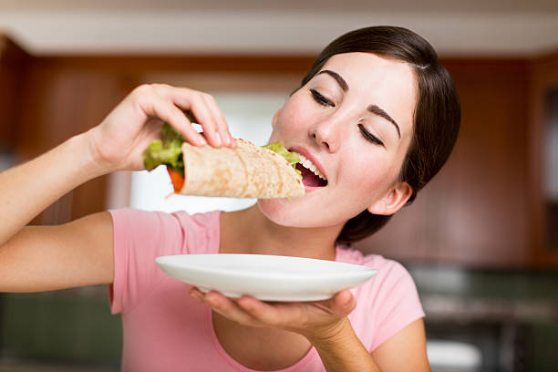 istock Smiling woman having tortilla 465907606
