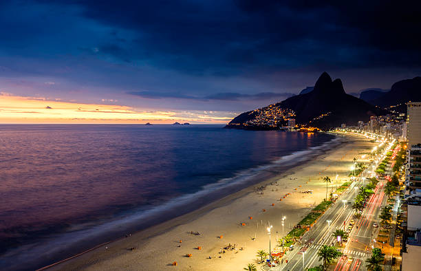 Sunset on Ipanema Beach in Rio de Janeiro, Brazil Sunset on Ipanema Beach in Rio de Janeiro, Brazil corcovado stock pictures, royalty-free photos & images