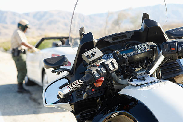 istock Police Officer Stopping a Speeding Car 465912260