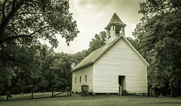 Smoky Mountain Chapel The Primitive Baptist Church in the Cades Cove valley is now a historical display in the Great Smoky Mountains National  Park. It is not a private property but is part of the national park. Gatlinburg, Tennessee. baptist stock pictures, royalty-free photos & images